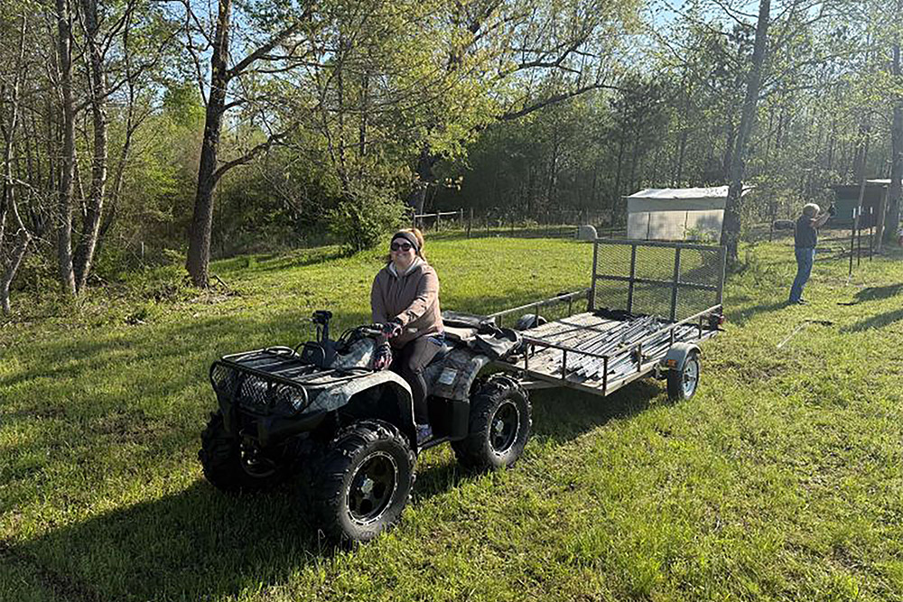 Helping Hands volunteers from Intrepid, an SPA Company, rolled up their sleeves and got to work at Next Step Farms.